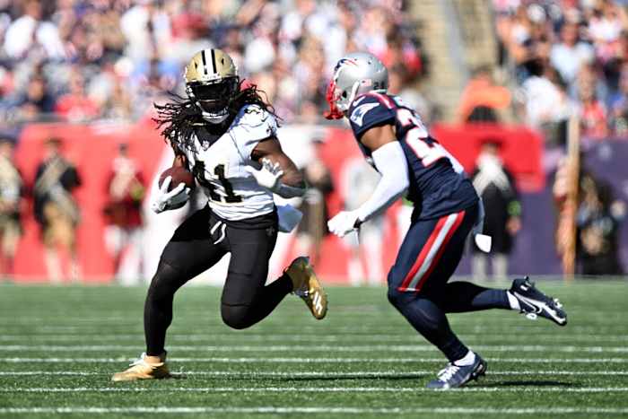 New Orleans Saints running back Alvin Kamara (41) runs past New England Patriots J.C. Jackson (29). Mandatory Credit: Brian Fluharty-USA TODAY Sports